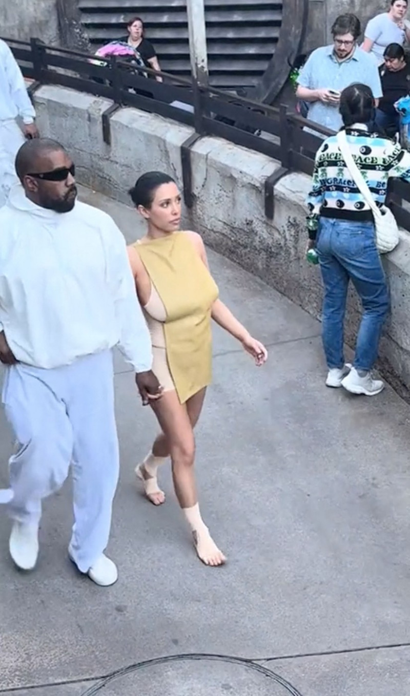 Kanye West’s wife Bianca Censori goes shoeless with bandaged feet as they visit Disneyland