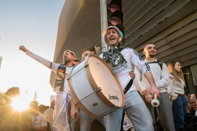 Madrid, Spain. 09th Apr, 2024. Real Madrid fans are seen cheering and chanting as they attend the Champions League football match against the British football team Manchester City at the Santiago Bernabu stadium. Credit: SOPA Images Limited/Alamy Live New