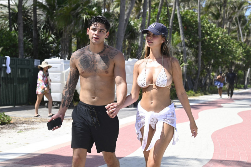 EXCLUSIVE: Boxing champion Ryan Garcia looks happy as he strolls hand-in-hand with bikini-clad stunner Grace Boor in Miami Beach after cozying up to model Alexa Dellanos