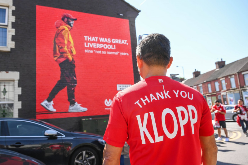 Premier League Liverpool v Wolverhampton Wanderers A fan with Thank you Klopp looks at the Jürgen Klopp Manager goodbye