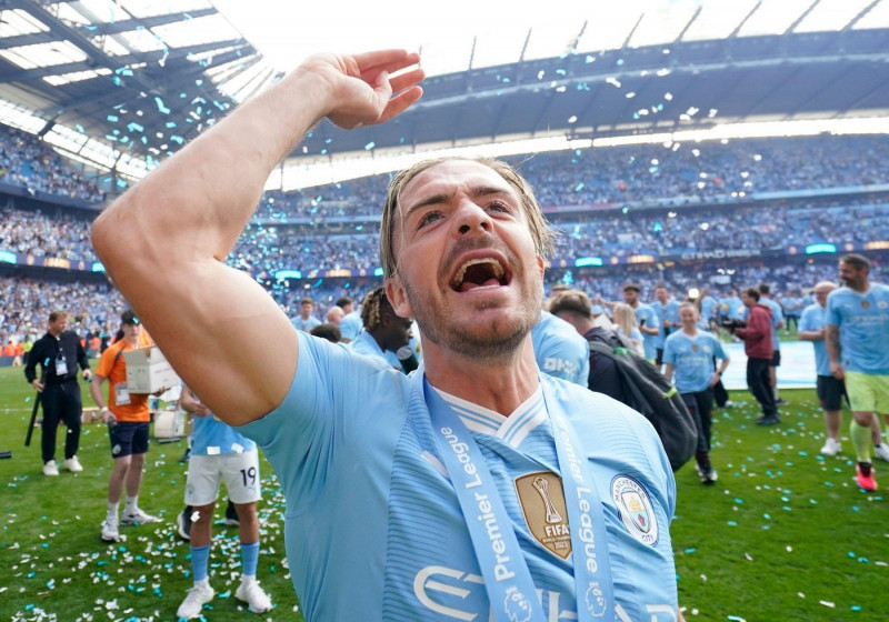 Manchester, UK. 19th May, 2024. Jack Grealish of Manchester City celebrates after winning the Premier league trophy during the Premier League match at the Etihad Stadium, Manchester. Picture credit should read: Andrew Yates/Sportimage Credit: Sportimage L