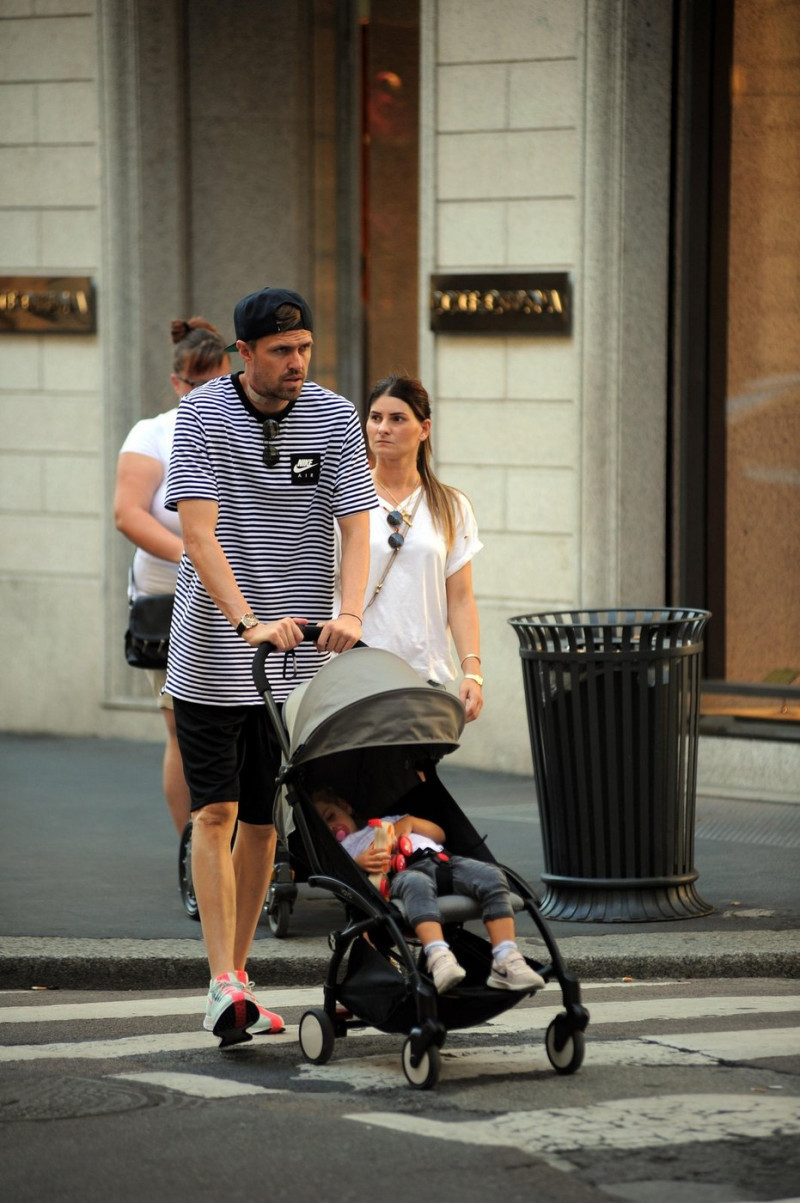 Milan, Josip Ilicic and family walking in the center Josip Ilicic, the Slovenian striker of ATALANTA and SLOVENIA national team, arrives in the center with his wife TINA and little VICTORIA, born in February 2013. Here is ILICIC while carrying the strolle