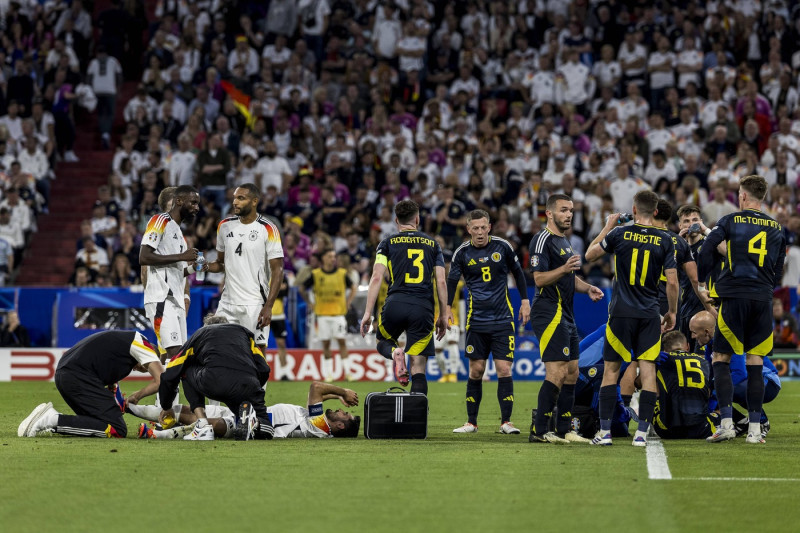 UEFA EURO 2024: Eröffnungsspiel Deutschland - Schottland; 14.06.2024 Ilkay Gündogan (Deutschland, 21) und Ryan Porteous
