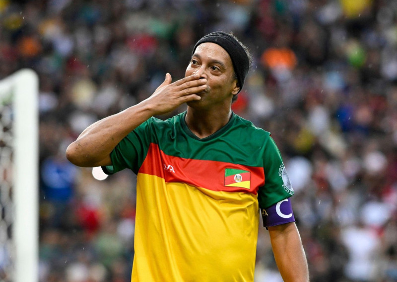 Rio De Janeiro, Brazil. 26th May, 2024. Ronaldinho Gaucho of Unio celebrates scoring a goal during the charity football match between Unio and Esperana at the Maracan Stadium in Rio de Janeiro, Brazil. The game was organized to raise money for the victims
