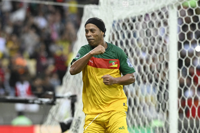 Ronaldinho Gaucho of Uniao celebrates scoring a goal during the charity football match between Uniao and Esperanca at th