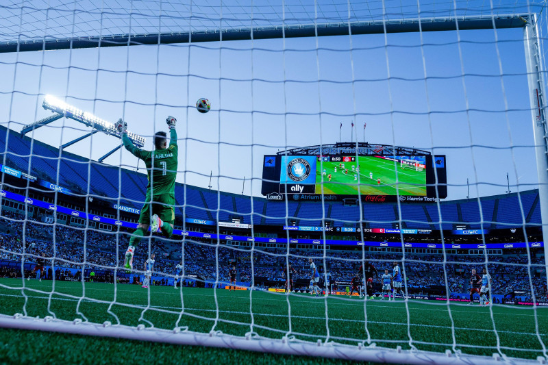 Charlotte, NC, USA. 13th Apr, 2024. Charlotte FC goalkeeper Kristijan Kahlina (1) knocks the ball away against the Toronto FC in the Major League Soccer match up at Bank of America Stadium in Charlotte, NC. (Scott KinserCal Sport Media). Credit: csm/Alam