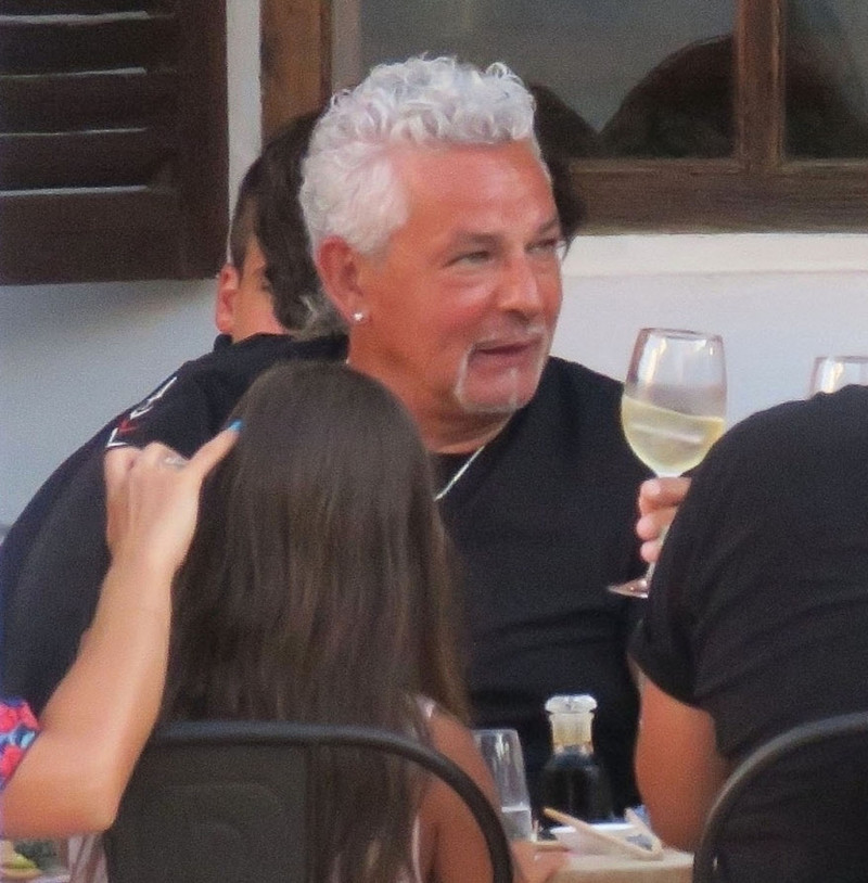 *EXCLUSIVE* The legendary former Italian footballer Roberto Baggio dressed in black for a family dinner out on holiday in Formentera.