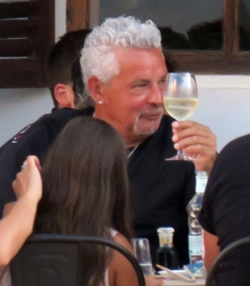 *EXCLUSIVE* The legendary former Italian footballer Roberto Baggio dressed in black for a family dinner out on holiday in Formentera.