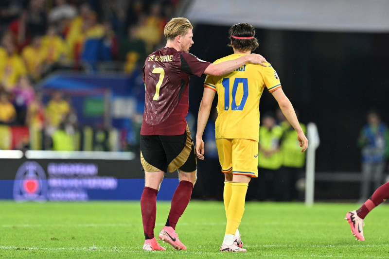 240622 EURO2024 BELGIUM VS ROMANIA Kevin De Bruyne (7) of Belgium and Ianis Hagi (10) of Romania pictured after a soccer