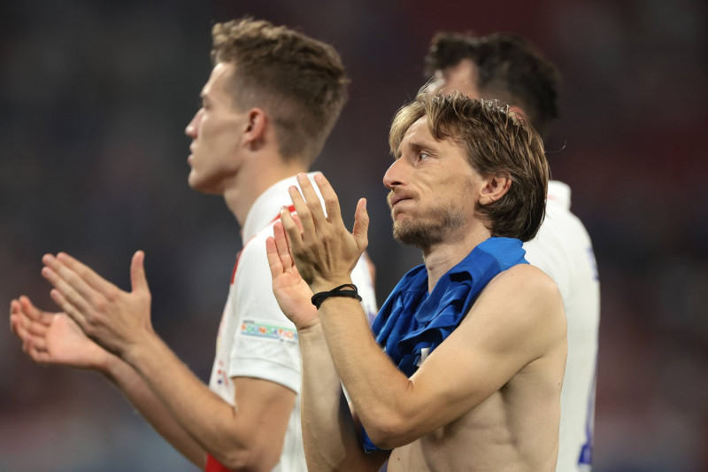 Leipzig, Germany, 24th June 2024. A dejected Luka Modric of Croatia applauds the fans following the final whistle of the