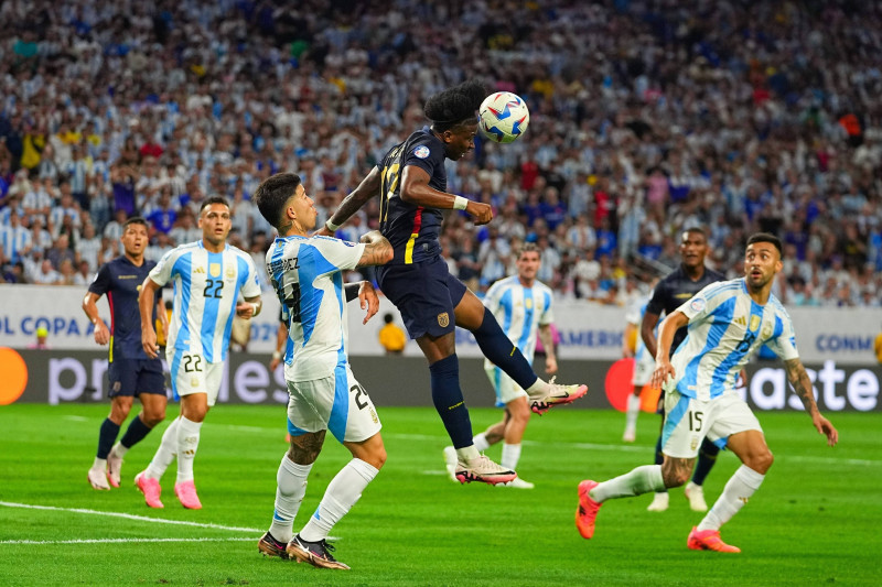 RECORD DATE NOT STATED Copa America USA 2024 Argentina vs Ecuador Quarterfinals Enzo Fernandez (L) of Argentina jumps fo