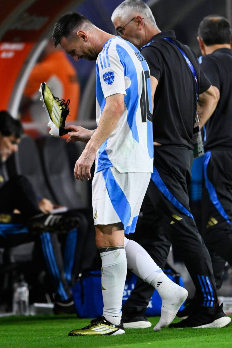 RECORD DATE NOT STATED Copa America USA 2024 Argentina vs Colombia - Final Lionel Messi leaves the pitch after picking u