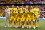 MUNICH - Back row (l-r) Romania goalkeeper Florin Nita, Radu Dragusin of Romania, Vasile Mogos of Romania, Andrei Raiu of Romania, Denis Dragus of Romania, Dennis Man of Romania, Andrei Burca of Romania. Front row (l-r) Ianis Hagi of Romania, Razvan Marin