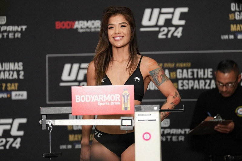 PHOENIX, AZ - May 6: Tracy Cortez steps on the scale at Hyatt Regency for UFC 274 - Oliveira vs Gaethje : Official Weigh-in on May 6, 2022 in Phoenix, Arizona, United States. (Photo by Louis Grasse/PxImages)