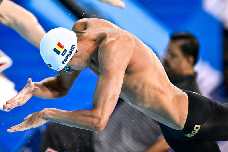 Paris, France. 28th July, 2024. David Popovici of Romania competes in the swimming 200m Freestyle Men Heats during the Paris 2024 Olympic Games at La Defense Arena in Paris (France), July 28, 2024. Credit: Insidefoto di andrea staccioli/Alamy Live News