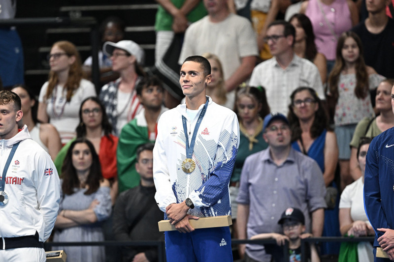 Nanterre, France. 29th July, 2024. Gold Medalist David Popovici of Team Roumanie stands on the podium during the Swimming medal ceremony after the men's 200m IFree Style Final at the Olympic Games Paris 2024 at Paris La Defense Arena on July 29, 2024 in N