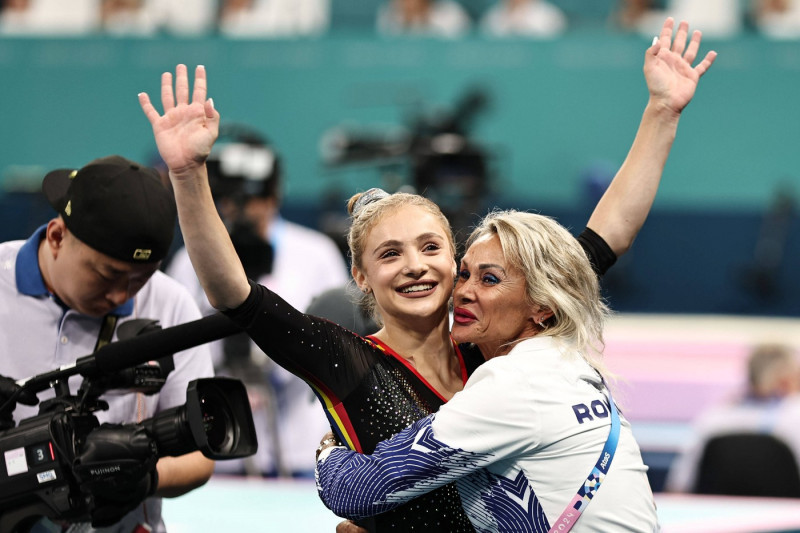 Sabrina Voinea-Maneca with her mother Camelia Voinea, ROU, after beam during qualification at 2024 Olympic Games, Olympi