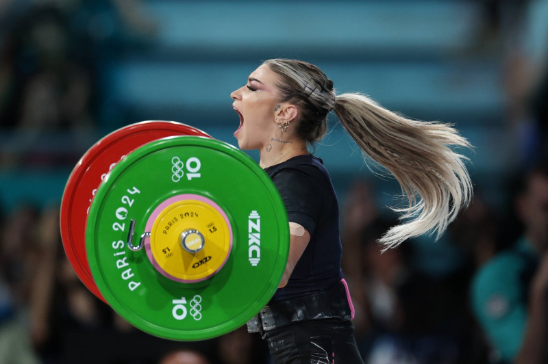 PARIS, FRANCE - AUGUST 07: Cambei Mihaela Valentina of Team Romania competes during the Weightlifting - Women s 49kg on