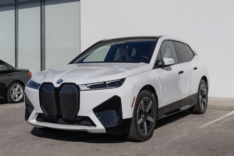 Indianapolis - February 11, 2024: BMW iX xDrive50 display at a dealership. BMW offers the iX xDrive50 with a 516hp motor and range up to 324 mi. MY:20