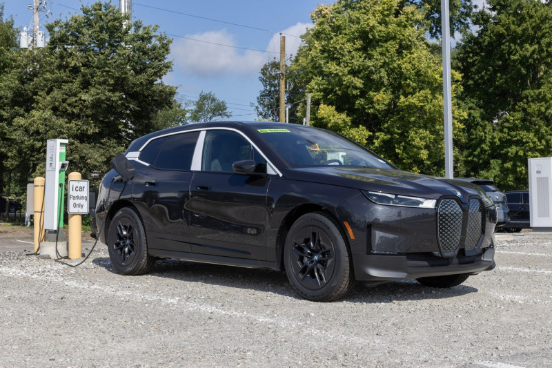 Indianapolis - September 3, 2023: BMW iX xDrive50 EV Electric Vehicle display at a dealership. BMW offers the iX xDrive50 with up to 300 miles of rang