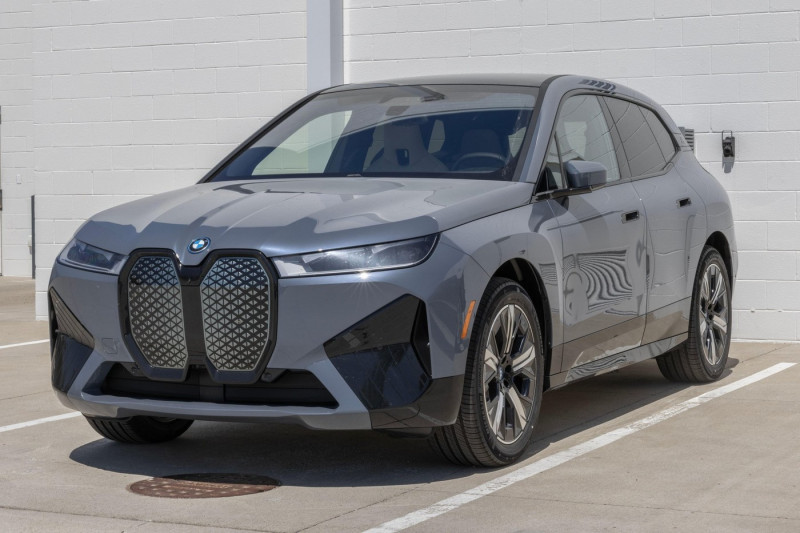 Lafayette - April 25, 2024: BMW iX xDrive50 display at a dealership. BMW offers the iX xDrive50 with a 516hp motor and range up to 324 miles. MY:2024