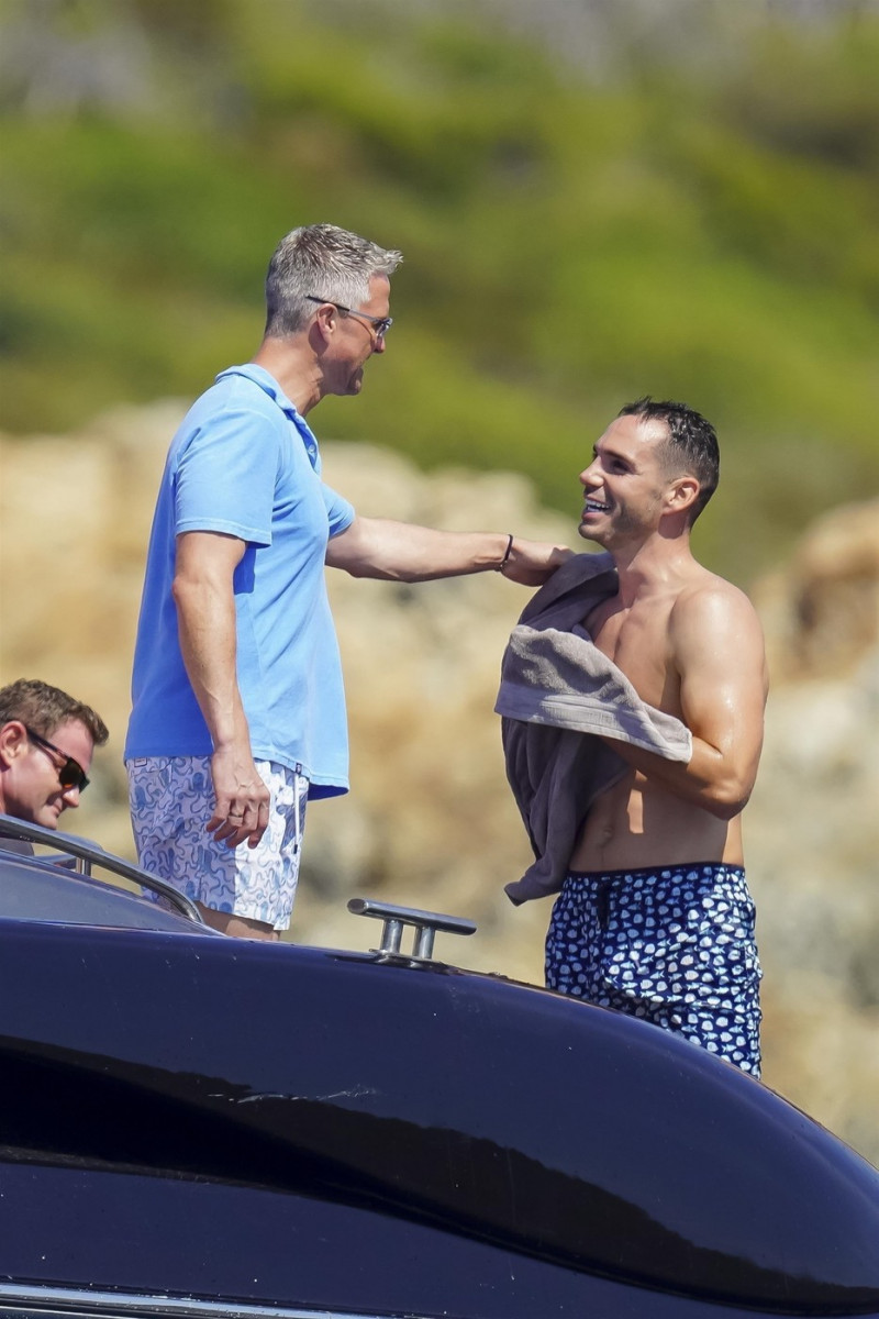 *EXCLUSIVE* *WEB MUST CALL FOR PRICING* German former racing driver Ralf Schumacher and his partner Etienne enjoy a few tender moments aboard a yacht on a day out at sea in St. Tropez