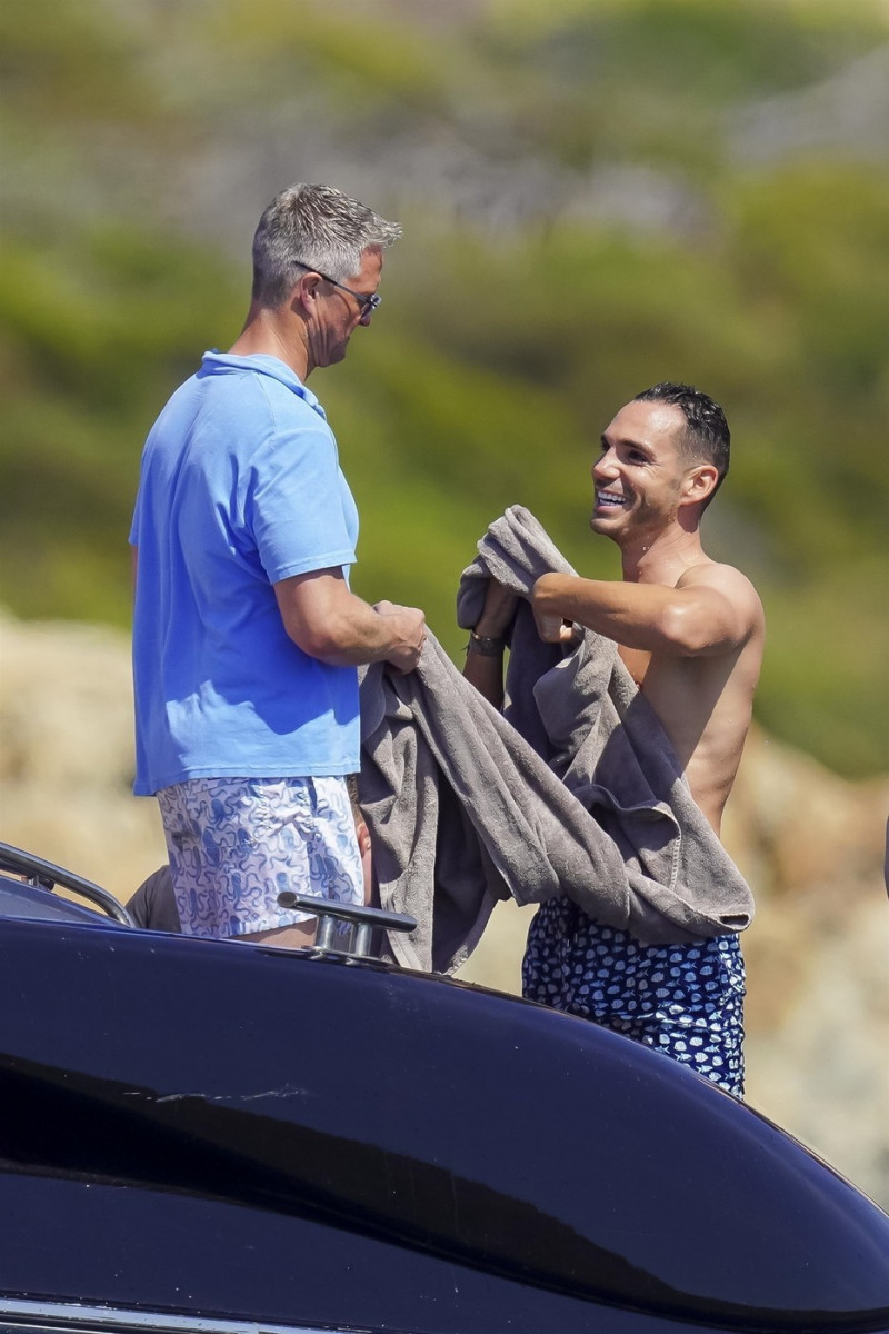 *EXCLUSIVE* *WEB MUST CALL FOR PRICING* German former racing driver Ralf Schumacher and his partner Etienne enjoy a few tender moments aboard a yacht on a day out at sea in St. Tropez