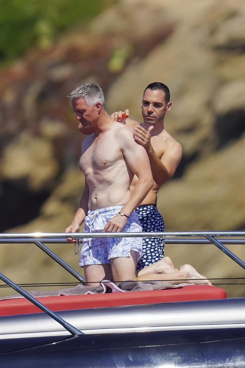 *EXCLUSIVE* *WEB MUST CALL FOR PRICING* German former racing driver Ralf Schumacher and his partner Etienne enjoy a few tender moments aboard a yacht on a day out at sea in St. Tropez