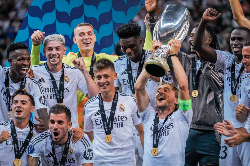 2024 UEFA Super Cup: Real Madrid vs. Atalanta Captain Luka Modric lifts the trophy after the 2024 UEFA Super Cup: Real M