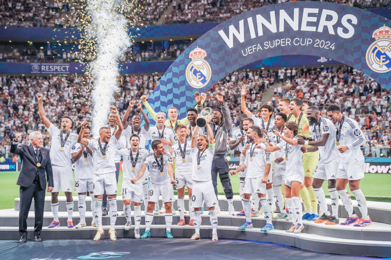 2024 UEFA Super Cup: Real Madrid vs. Atalanta Captain Luka Modric lifts the trophy after the 2024 UEFA Super Cup: Real M