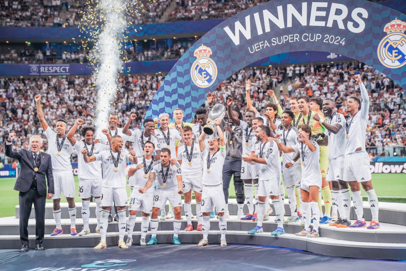 2024 UEFA Super Cup: Real Madrid vs. Atalanta Captain Luka Modric lifts the trophy after the 2024 UEFA Super Cup: Real M