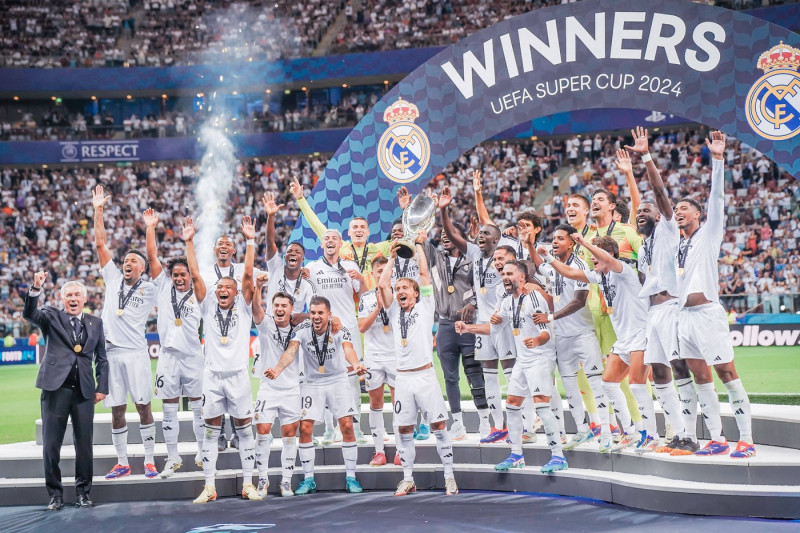 2024 UEFA Super Cup: Real Madrid vs. Atalanta Captain Luka Modric lifts the trophy after the 2024 UEFA Super Cup: Real M