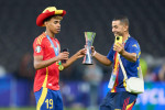 Lamine Yamal, ESP 19 with father Mounir Nasraoui aus Larache at the winners ceremony after the final match SPAIN - ENGLAND 2-1of the UEFA European Championships 2024 on Jul 14, 2024 in Berlin, Germany. Photographer: Peter Schatz