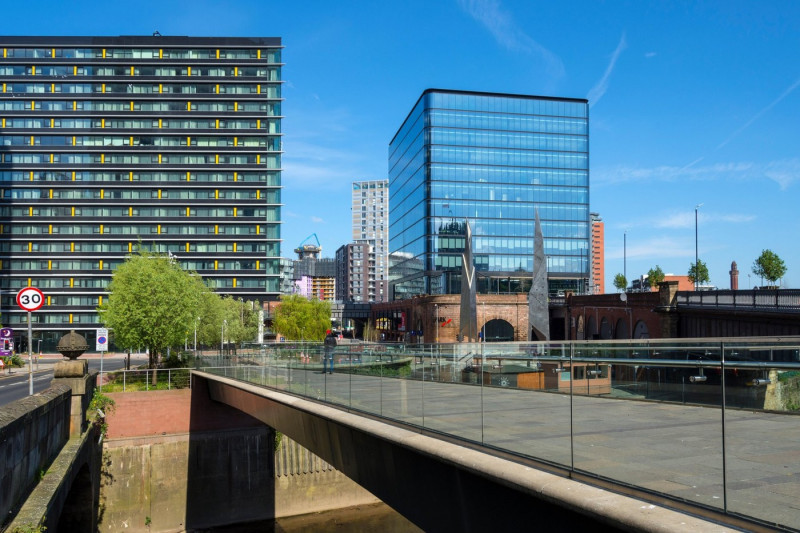 The 101 Embankment office and the CitySuites apartment buildings, from the Greengate Square footbridge, Salford, Manchester, England, UK