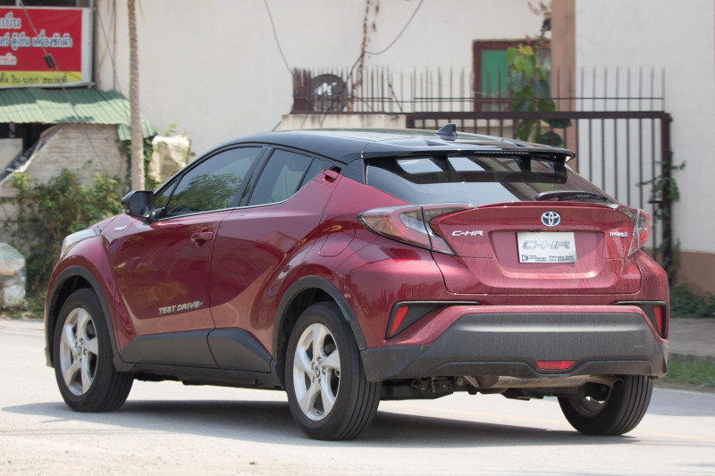 CHIANG MAI, THAILAND - APRIL 20 2018: New Toyota CHR Subcompact Crossover SUV Hybrid Car. Car on road No.121 to Chiangmai City.