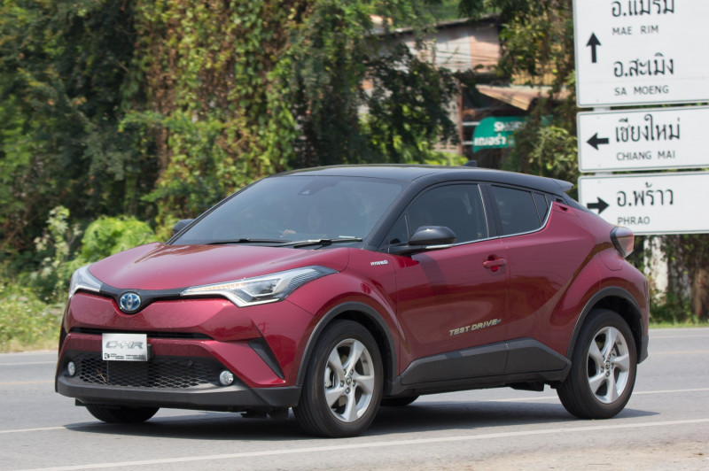 CHIANG MAI, THAILAND - APRIL 20 2018: New Toyota CHR Subcompact Crossover SUV Hybrid Car. Car on road No.121 to Chiangmai City.