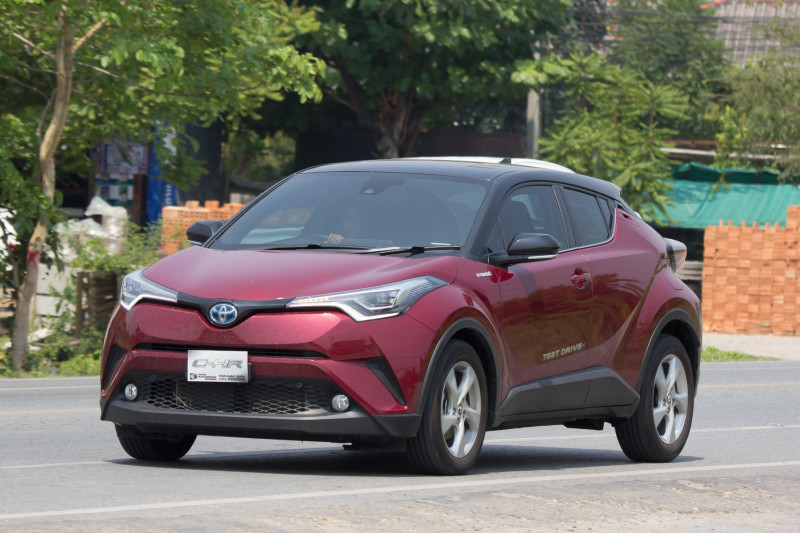 CHIANG MAI, THAILAND - APRIL 20 2018: New Toyota CHR Subcompact Crossover SUV Hybrid Car. Car on road No.121 to Chiangmai City.