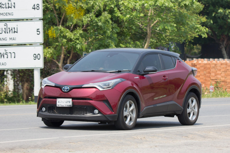 CHIANG MAI, THAILAND - APRIL 20 2018: New Toyota CHR Subcompact Crossover SUV Hybrid Car. Car on road No.121 to Chiangmai City.