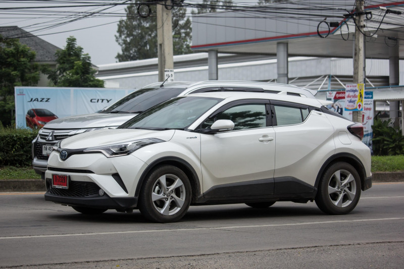 CHIANG MAI, THAILAND - JUNE 17 2018: New Toyota CHR Subcompact Crossover SUV Hybrid Car. Car on road No.121 to Chiangmai City.