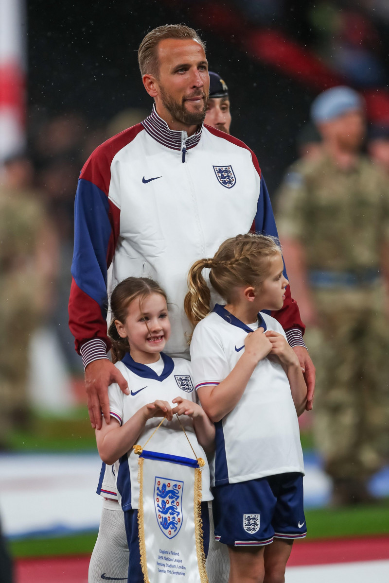 Harry Kane of England with his daughters during the national anthem during the UEFA Nations League - League B - Group 2 England v Finland at Wembley Stadium, London, United Kingdom, 10th September 2024(Photo by Gareth Evans/News Images)