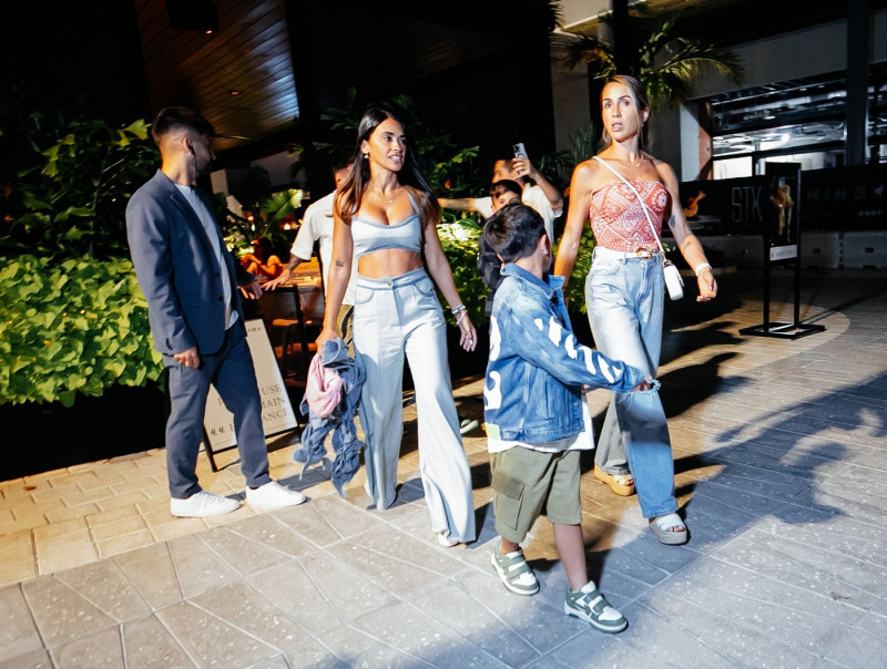 Lionel Messi and wife Antonela Roccuzzo join teammate Luis Suarez for a family meal at The Amalfi Llama in Miami on May 26 - with Messi getting mobbed by fans as he left