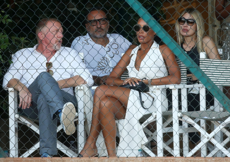 *EXCLUSIVE* *WEB MUST CALL FOR PRICING* Former German Tennis Legend Boris Becker shows off his public display of affection with his partner Lilian de Carvalho Monteiro at the charity event "Olimpiadi del Cuore" in Forte dei Marmi.