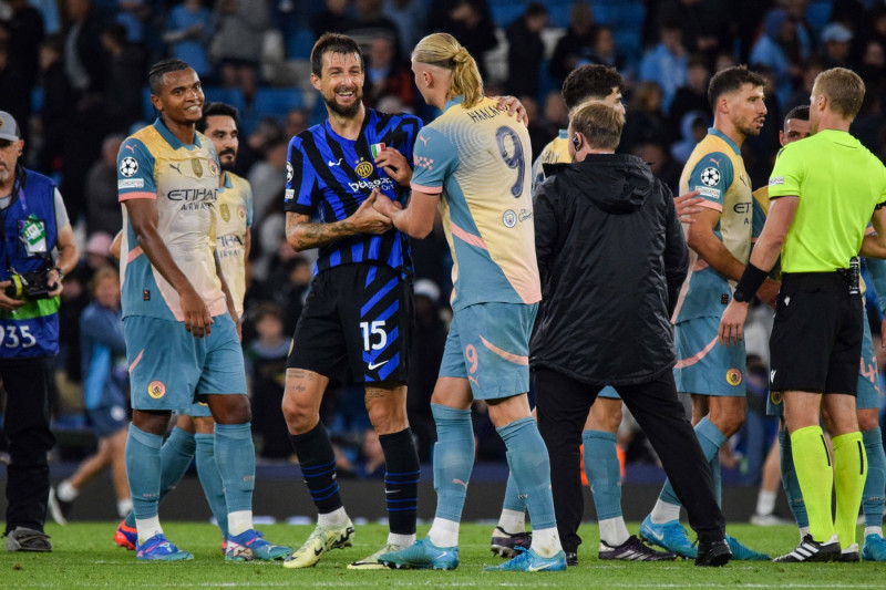 Manchester City FC v Inter Milan Manchester City forward Erling Haaland (9) and Inter Milan defender Francesco Acerbi (1