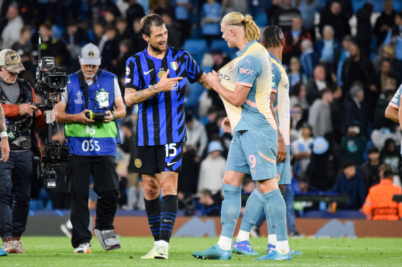 Manchester City FC v Inter Milan Manchester City forward Erling Haaland (9) and Inter Milan defender Francesco Acerbi (1