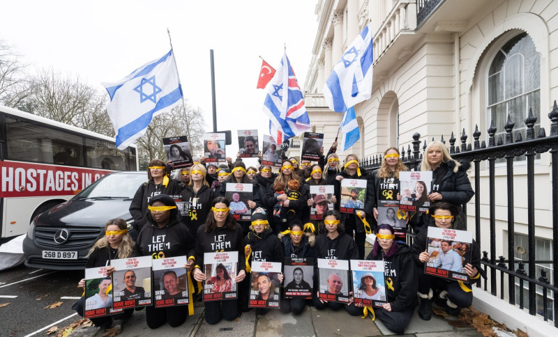 Hostage Families rally at three London embassies on World Human Rights Day in plea for intervention in releasing the 100 hostages held in Gaza, London, UK.
