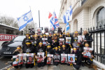 Hostage Families rally at three London embassies on World Human Rights Day in plea for intervention in releasing the 100 hostages held in Gaza, London, UK.