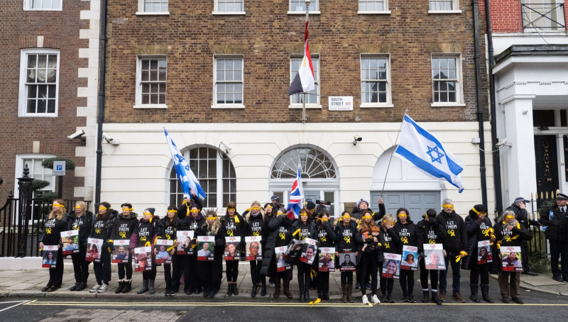 Hostage Families rally at three London embassies on World Human Rights Day in plea for intervention in releasing the 100 hostages held in Gaza, London, UK.