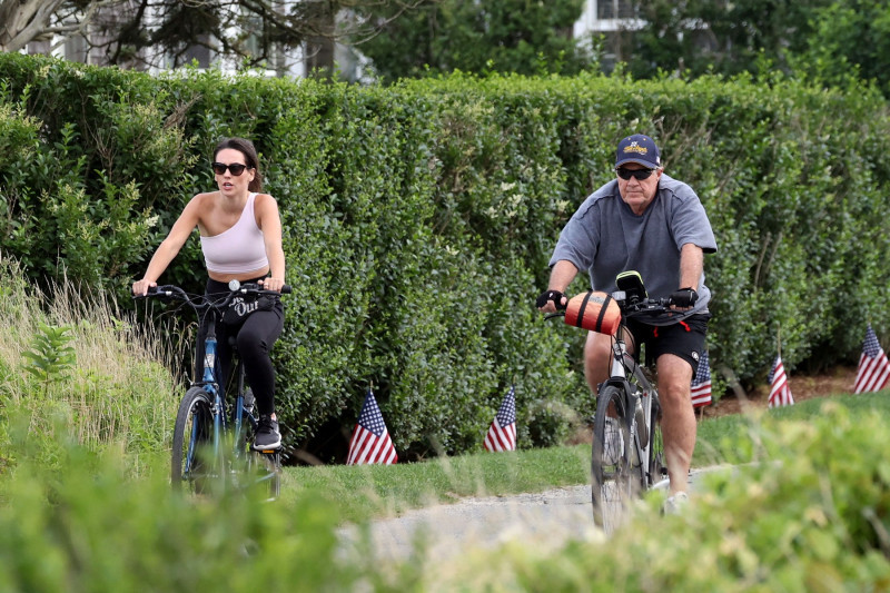 EXCLUSIVE: Bill Belichick and Jordon Hudson go for an early evening bike ride along the bike paths of Nantucket.