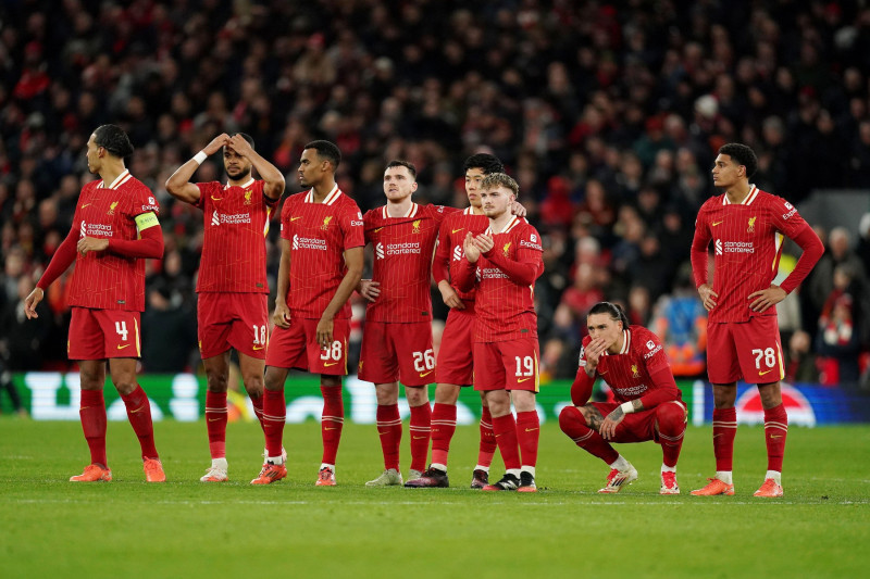 Liverpool's Darwin Nunez (second right) and team-mates react during the penalty shoot-out during the UEFA Champions League round of sixteen second leg match at Anfield, Liverpool. Picture date: Tuesday March 11, 2025.
