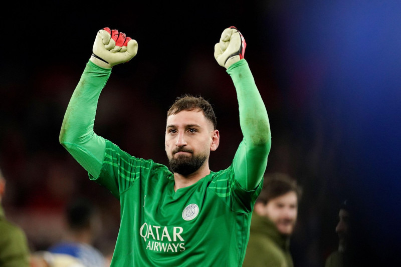 Paris Saint-Germain goalkeeper Gianluigi Donnarumma celebrates after winning the penalty shoot-out following the UEFA Champions League round of sixteen second leg match at Anfield, Liverpool. Picture date: Tuesday March 11, 2025.